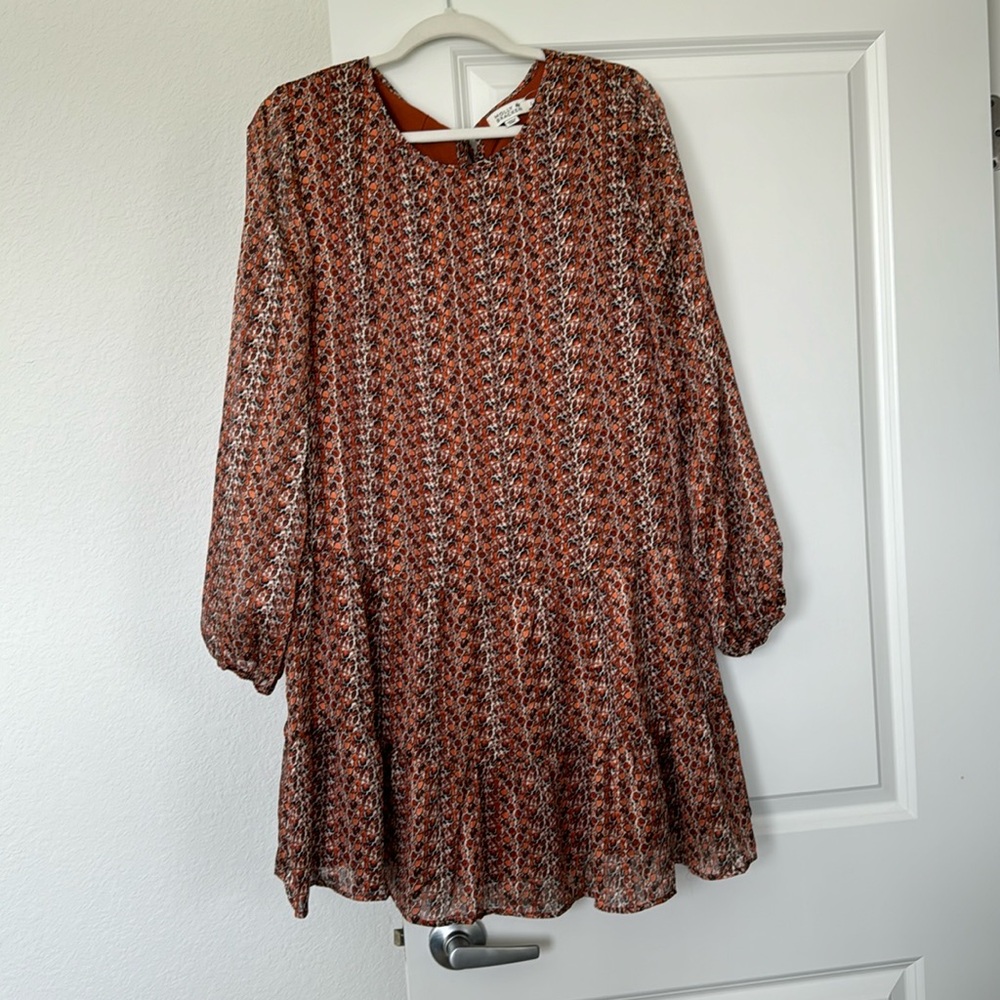 Bright orange and shimmery dress
